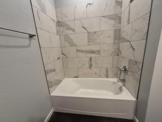 a bathroom with a bathtub