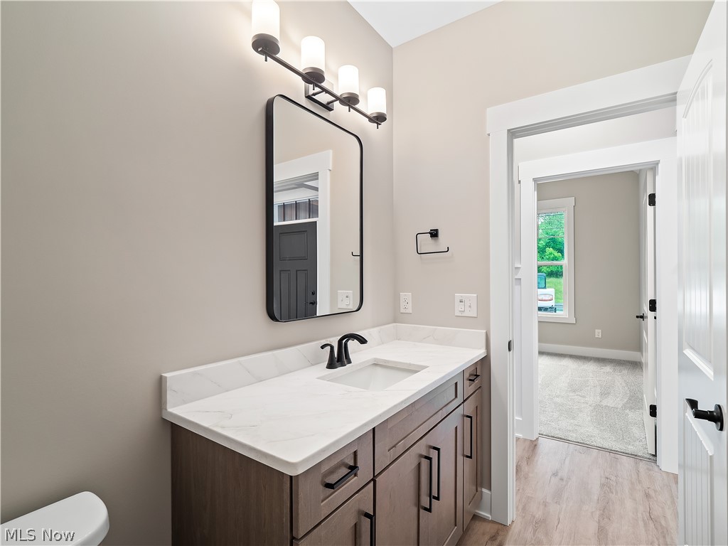 32 Brookside Lane North Ridgeville, OH 44039 - Photo 17 of 50 Bathroom featuring vanity and light wood-type flooring