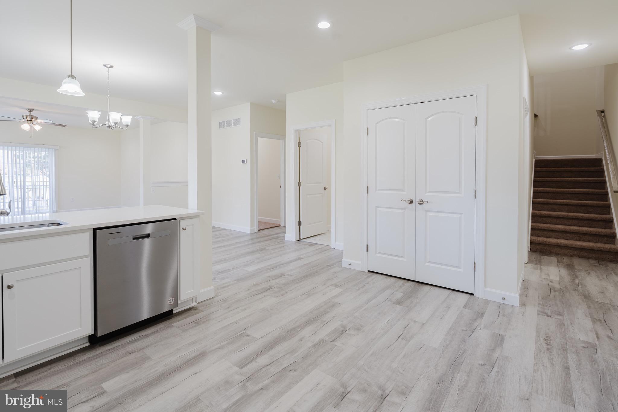 51 Mapledale Road Dover, DE 19904 - Photo 13 of 53 an empty room with wooden floor and windows