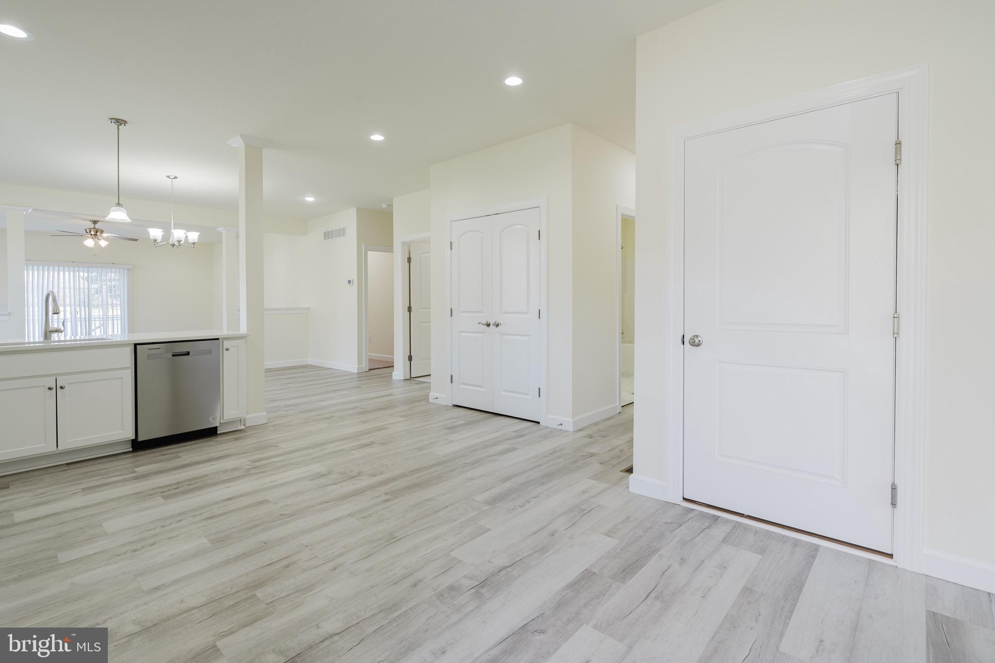 51 Mapledale Road Dover, DE 19904 - Photo 18 of 53 an empty room with wooden floor and windows