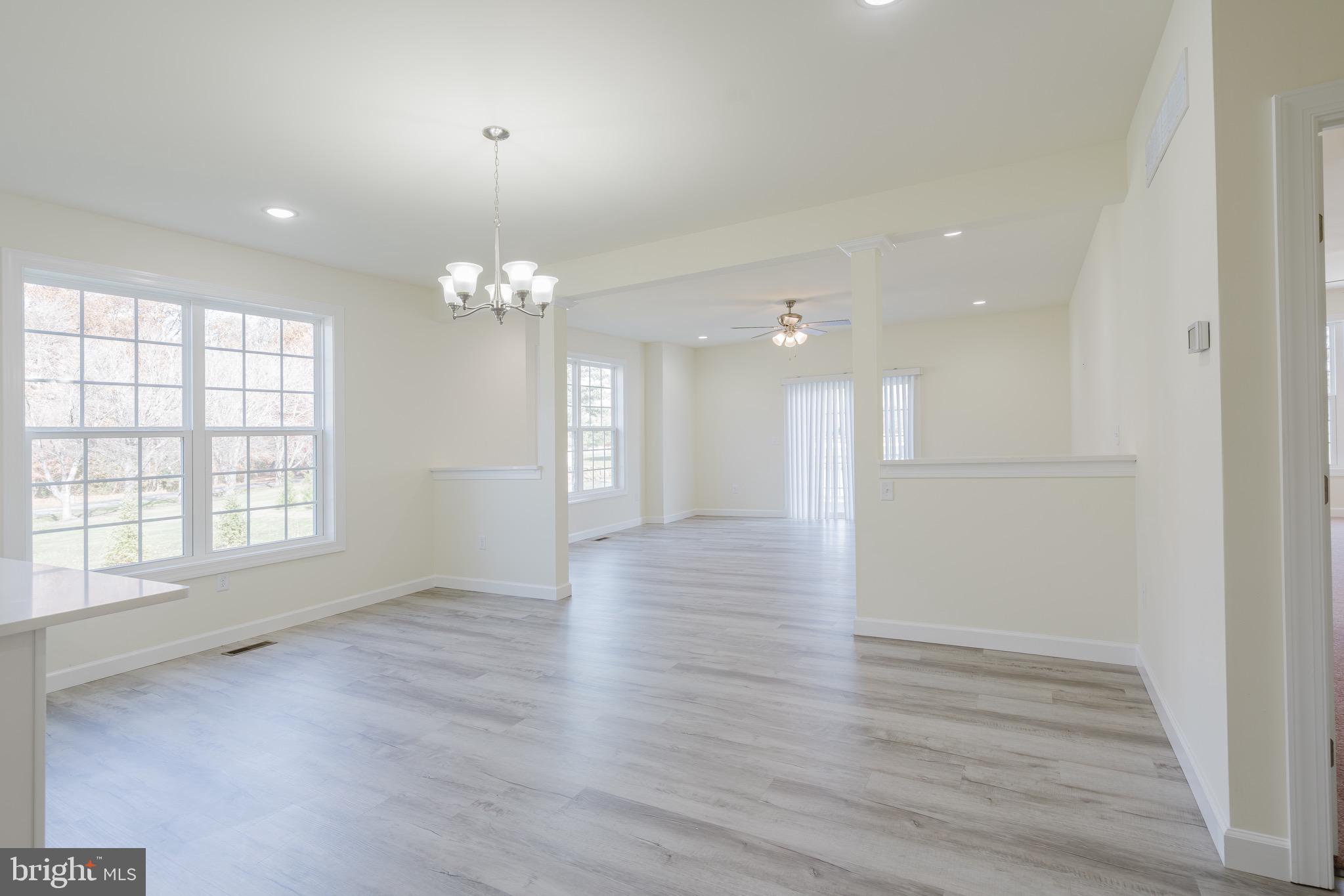 51 Mapledale Road Dover, DE 19904 - Photo 24 of 53 an empty room with wooden floor and windows