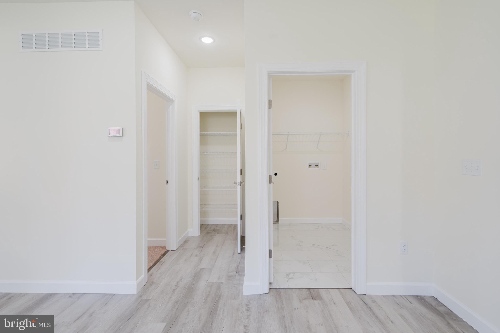 51 Mapledale Road Dover, DE 19904 - Photo 42 of 53 a view of a hallway with wooden floor