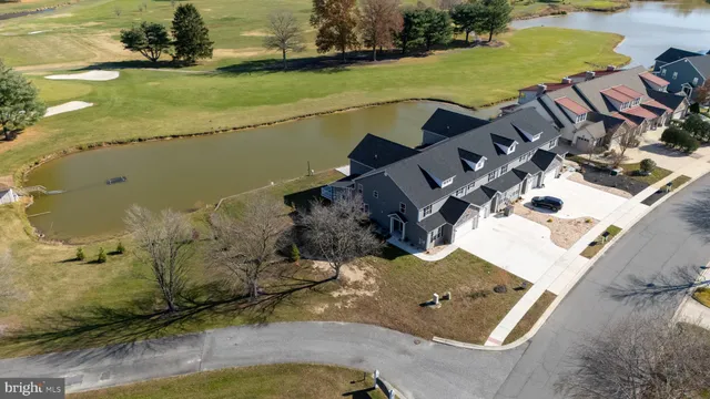 a view of a lake with a yard