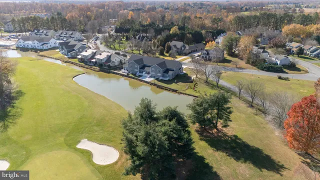 a view of a lake with a houses