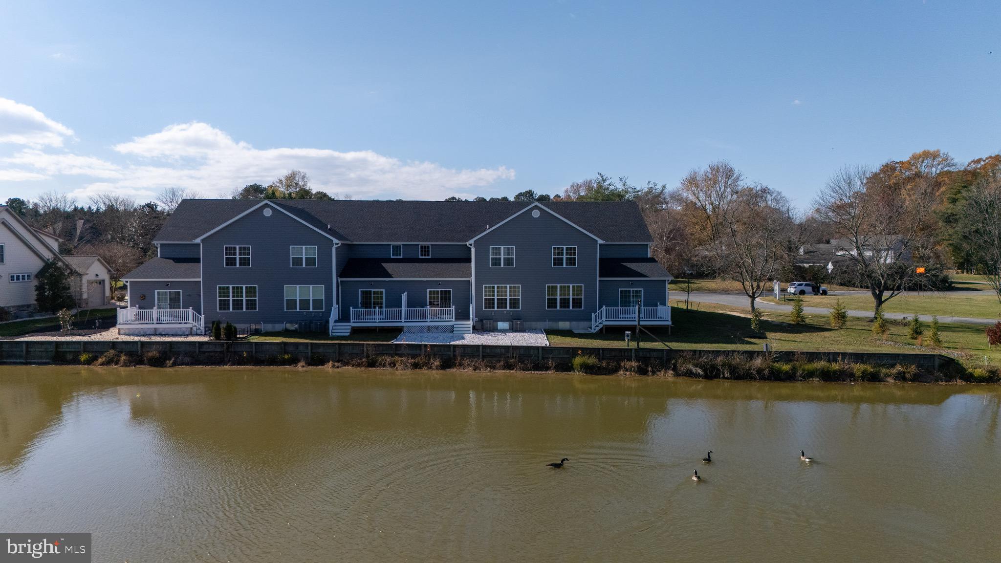 51 Mapledale Road Dover, DE 19904 - Photo 10 of 53 a view of a house with a lake view