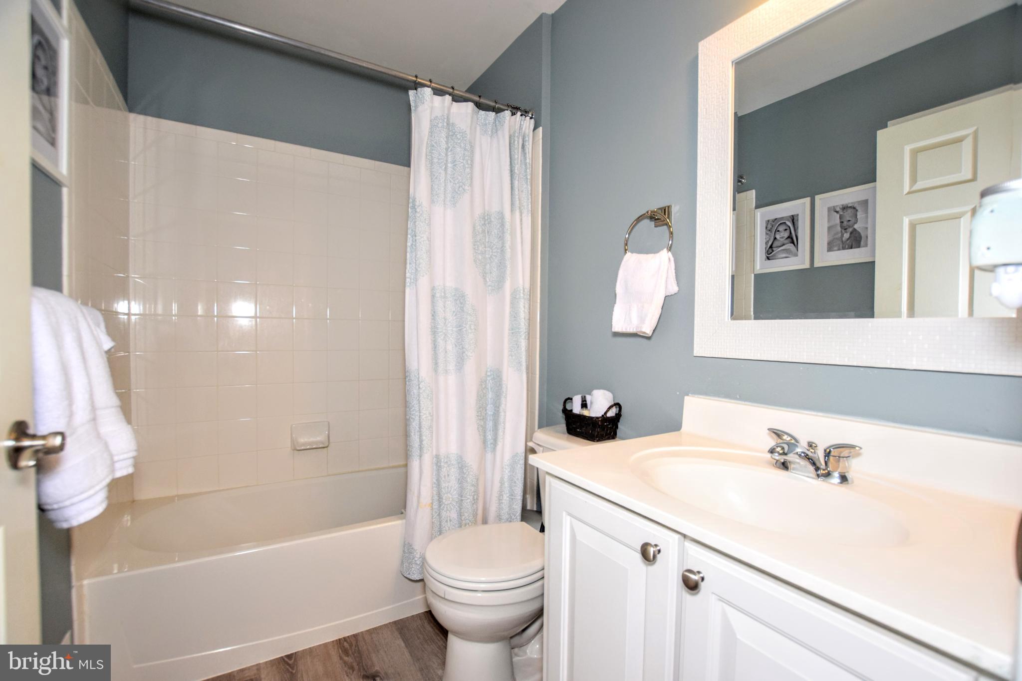 5103 Key View Way Perry Hall, MD 21128 - Photo 24 of 32 Hall Bathroom w/ Wood-like Floors!