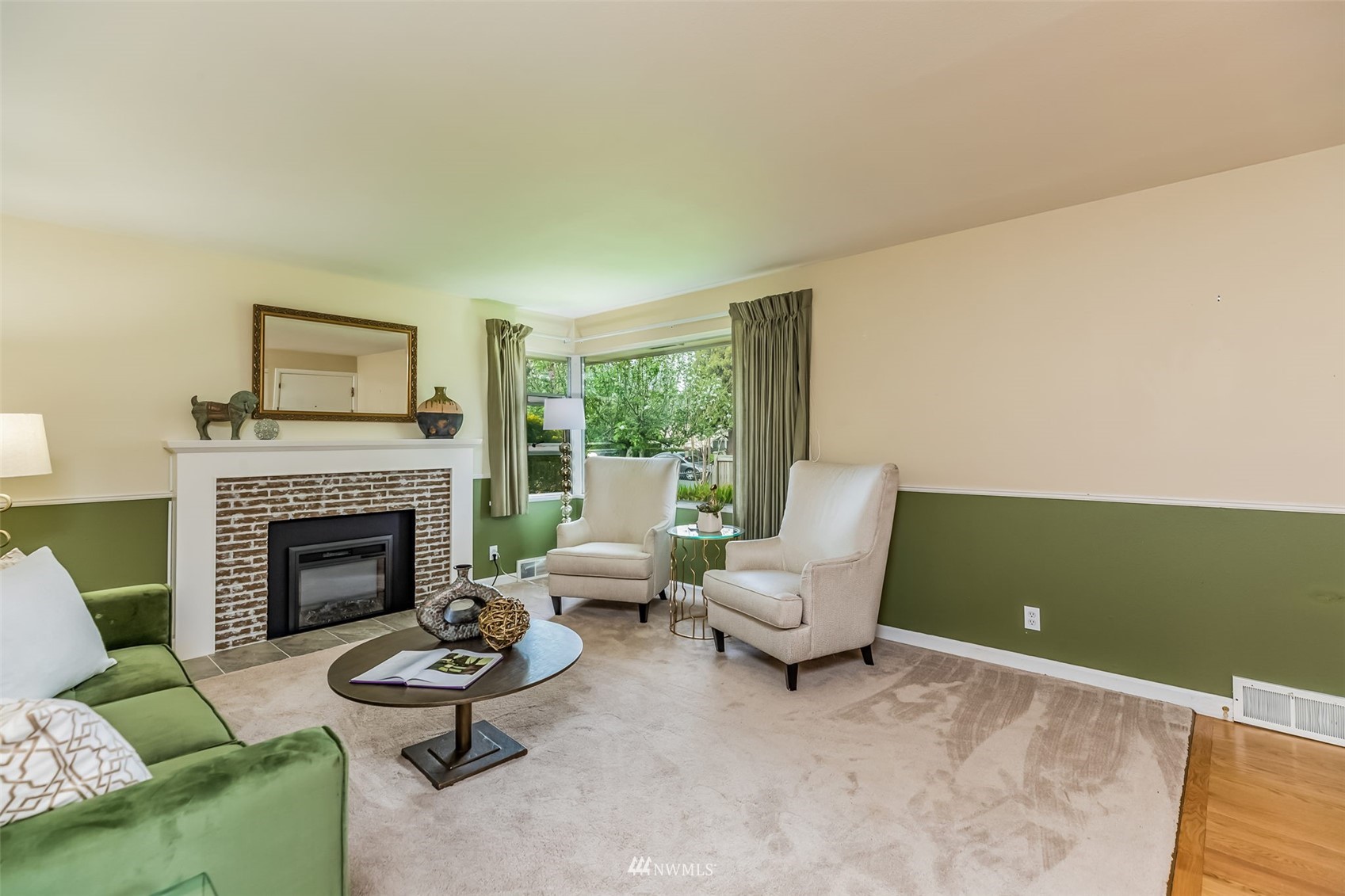 8402 13th Avenue Southwest Seattle, WA 98106 - Photo 4 of 40 a living room with furniture and a fireplace