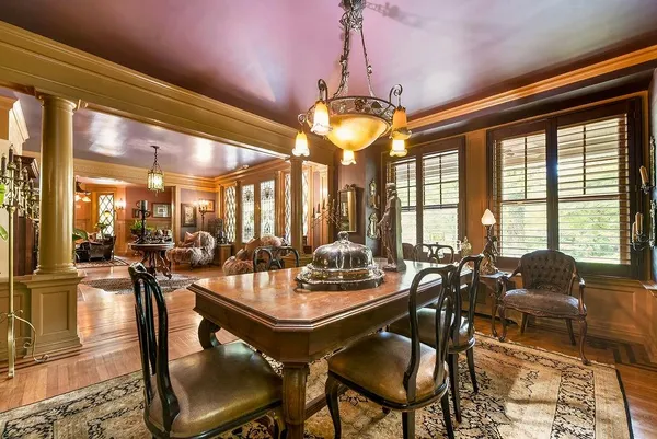 a view of a dining room with furniture window and outside view