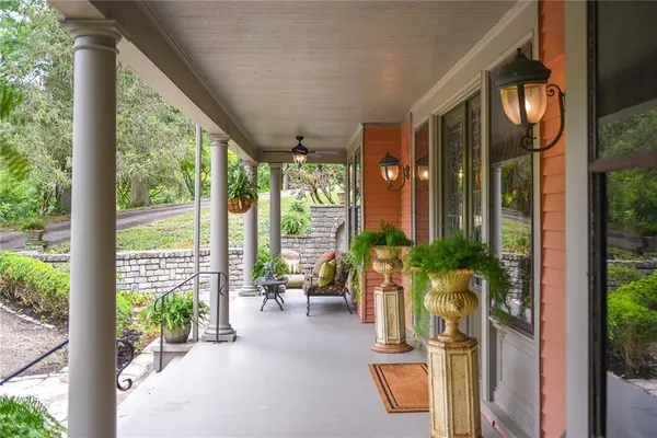 a house view with a seating space and garden view