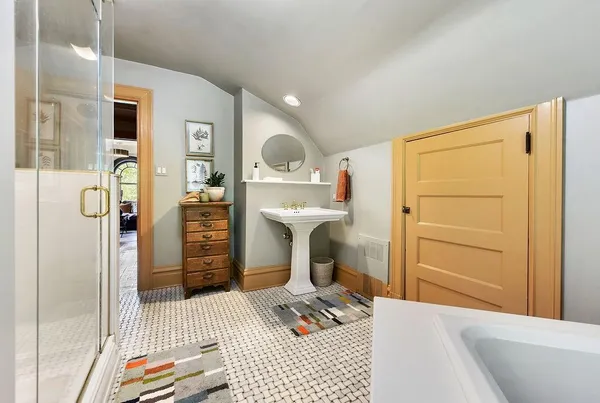 a bedroom with a bed and a cabinets