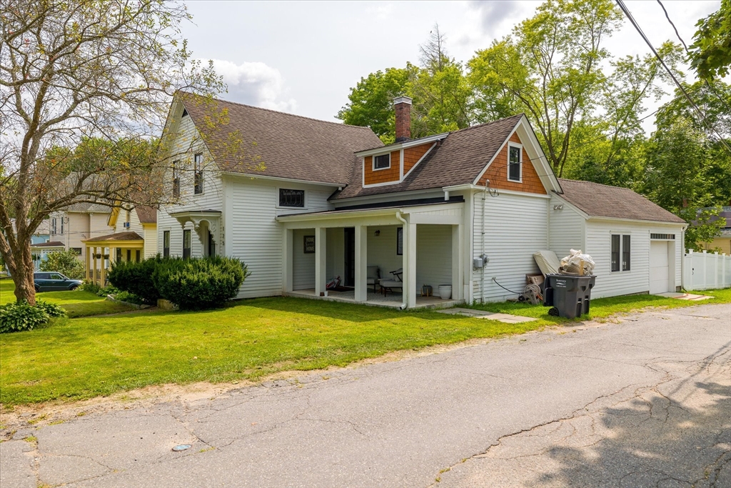 125 Center Bridge Road Lancaster, MA 01523 - Photo 4 of 36 a view of a house with swimming pool and porch