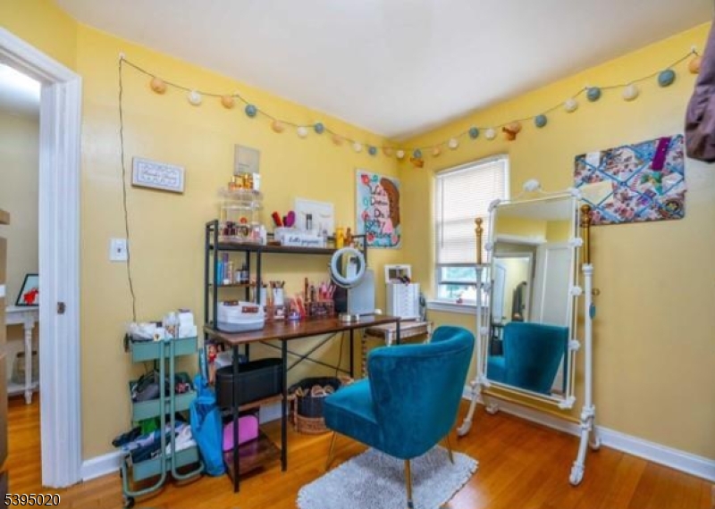 220 North 17th Street Bloomfield, NJ 07003 - Photo 9 of 19 a room with musical instrument pool table and windows