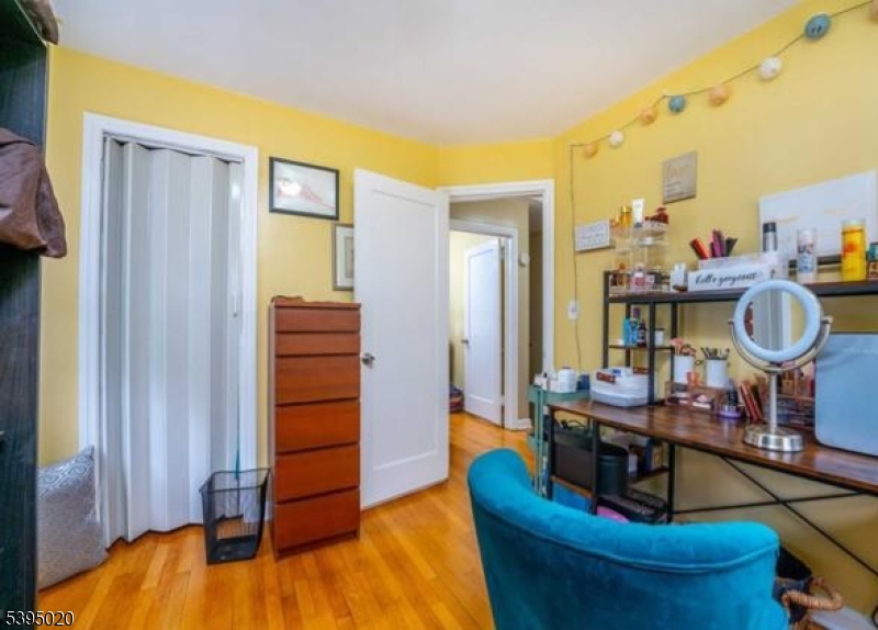 220 North 17th Street Bloomfield, NJ 07003 - Photo 10 of 19 a living room with furniture and wooden floor