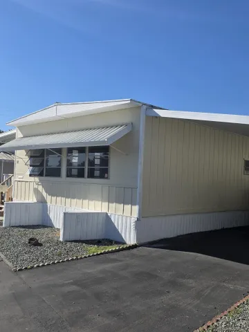 a front view of a house with a garage