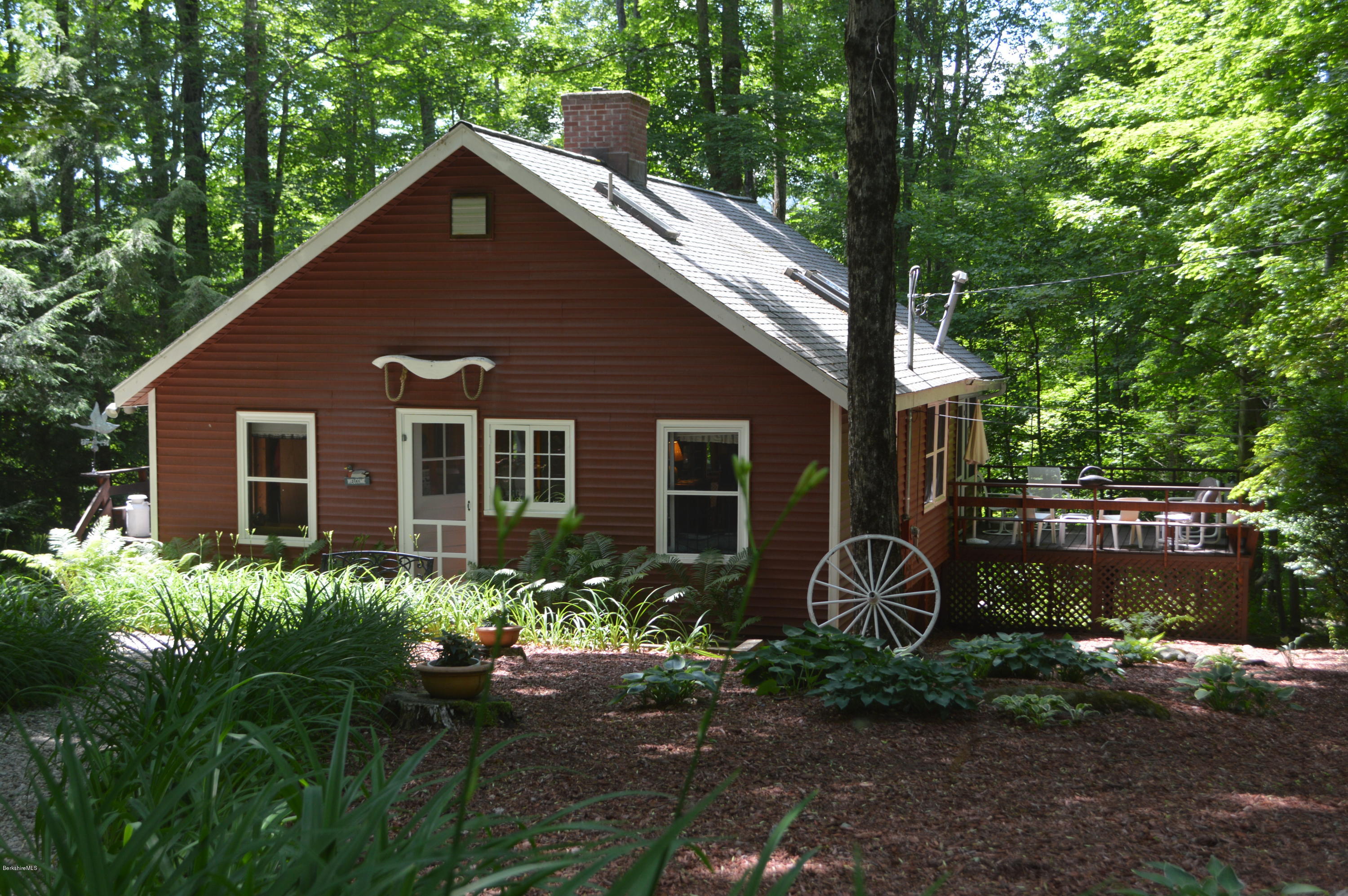 2 Massasoit Road Stockbridge, MA 01262 - Photo 1 of 31 a front view of a house with garden