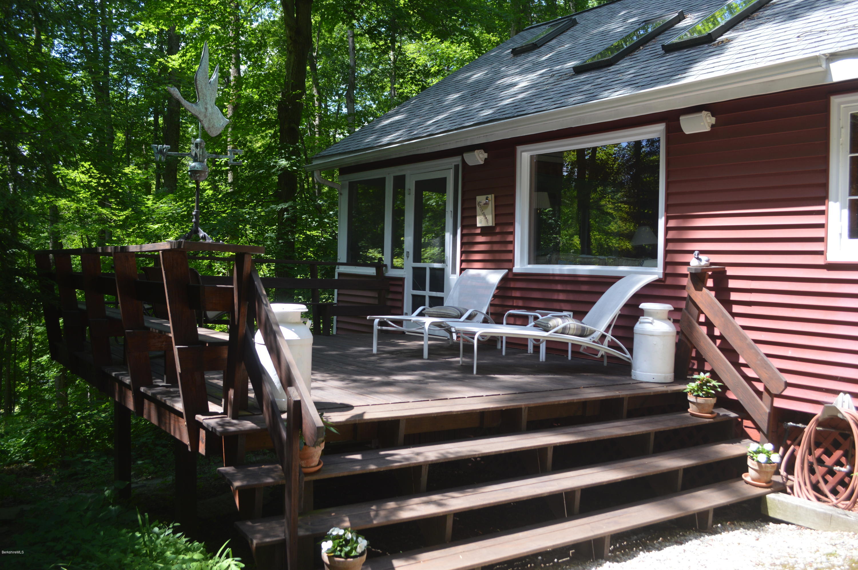 2 Massasoit Road Stockbridge, MA 01262 - Photo 3 of 31 a view of house with outdoor seating space