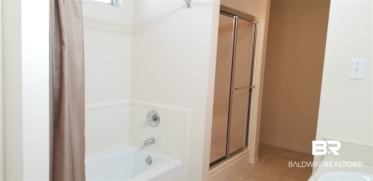 20086 Pecan Trace Fairhope, AL 36532 - Photo 31 of 44 Master walk in shower and separate tub