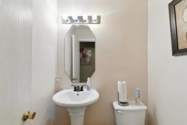 a bathroom with a sink and a toilet