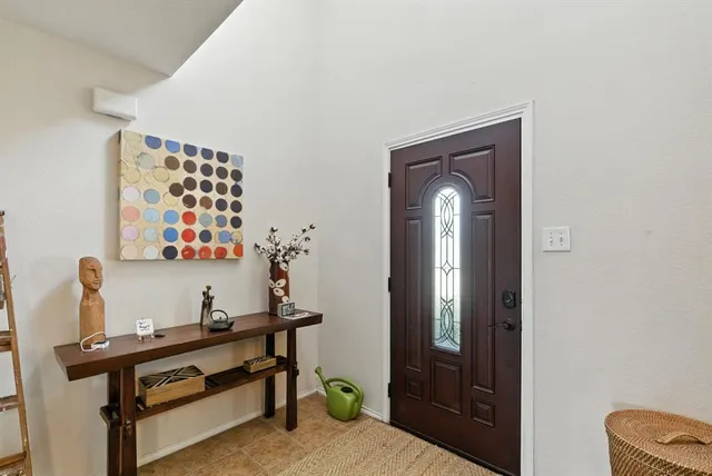 a view of workspace with mirror and furniture