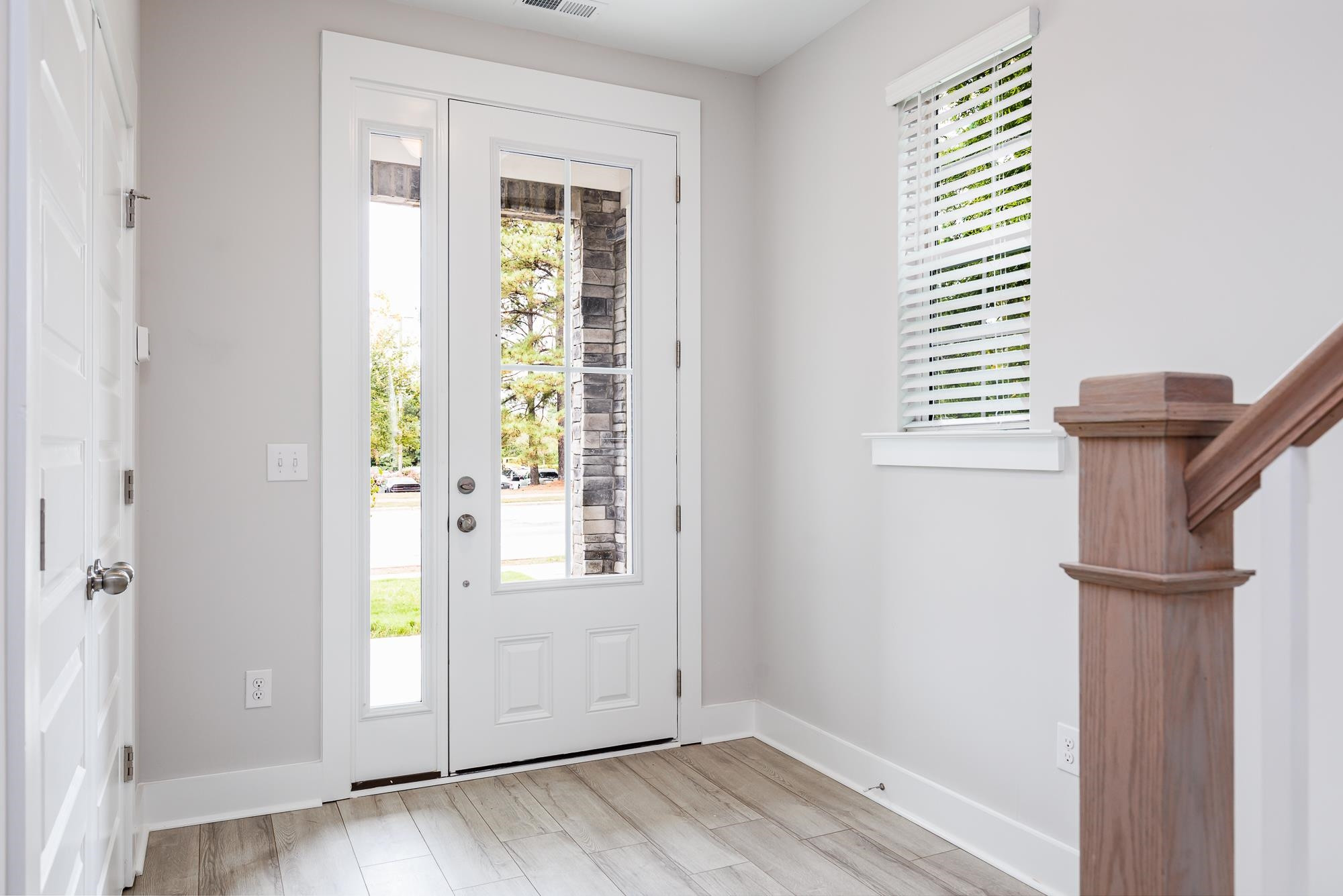 8520 Silsbee Drive Raleigh, NC 27613 - Photo 14 of 18 a view of entryway with wooden floor