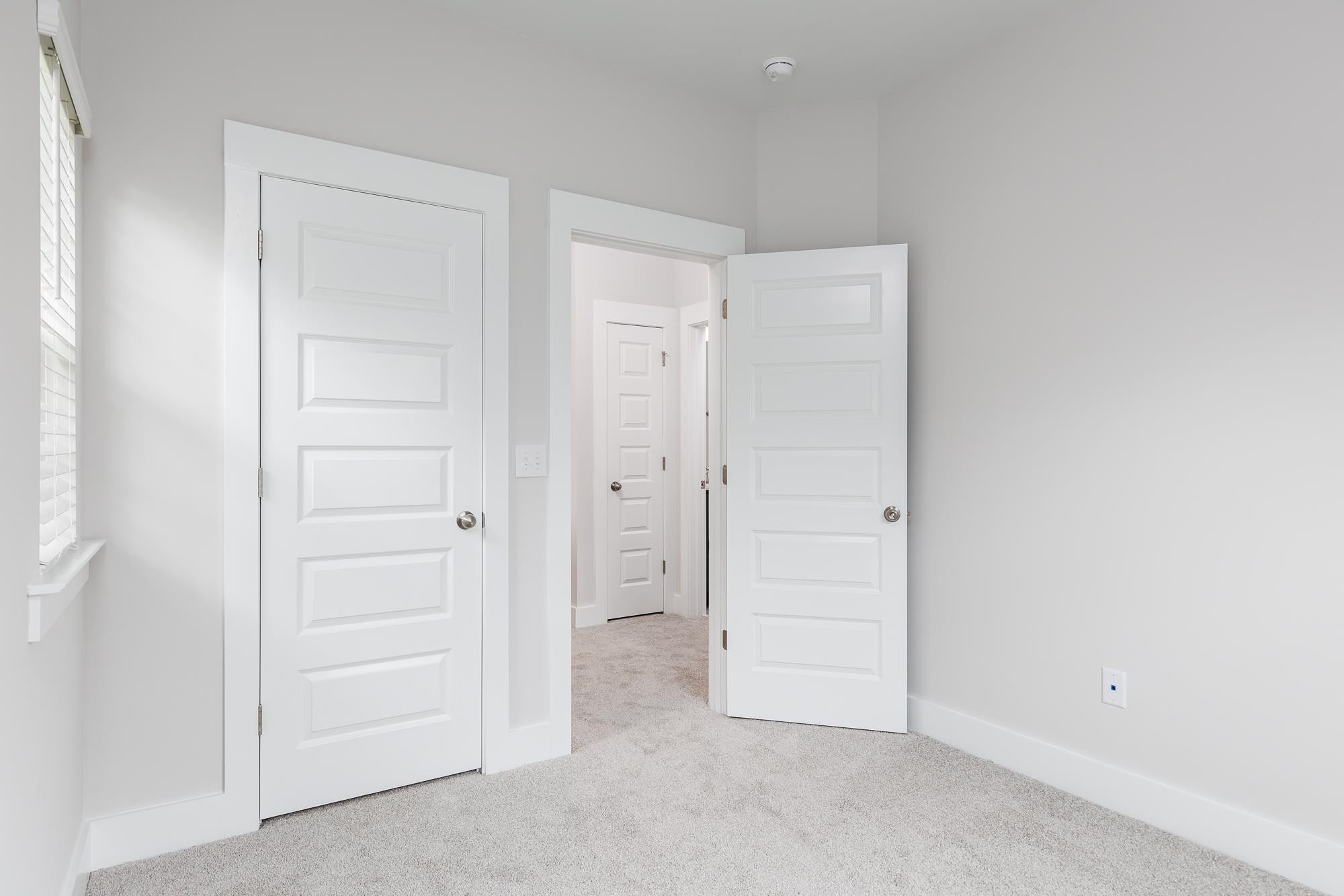 8520 Silsbee Drive Raleigh, NC 27613 - Photo 10 of 18 an empty room with closet area