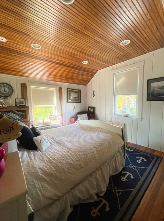 22 Howe Street Hingham, MA 02043 - Photo 12 of 12 a bedroom with a bed and a window