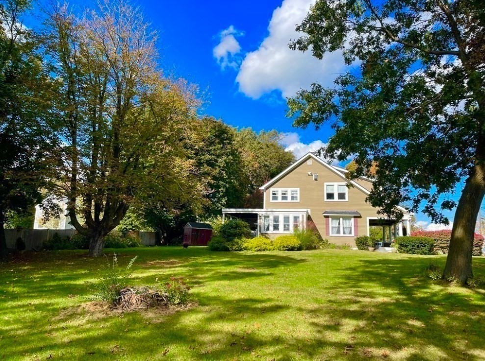 22 Howe Street Hingham, MA 02043 - Photo 3 of 12 a front view of house with yard and green space