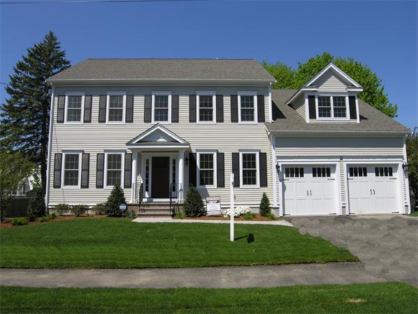 56 Berkshire Road Needham, MA 02492 - Photo 1 of 22 a front view of a house with a yard
