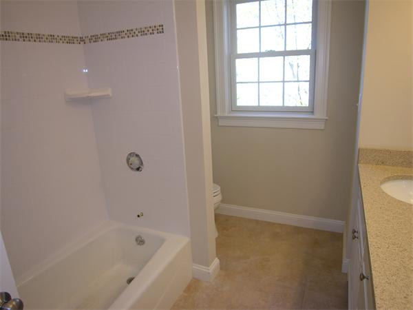 56 Berkshire Road Needham, MA 02492 - Photo 19 of 22 a bathroom with a bathtub