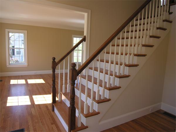 56 Berkshire Road Needham, MA 02492 - Photo 5 of 22 a view of entryway with wooden floor and stairs