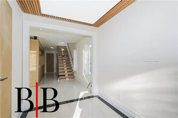 a view of a hallway with windows