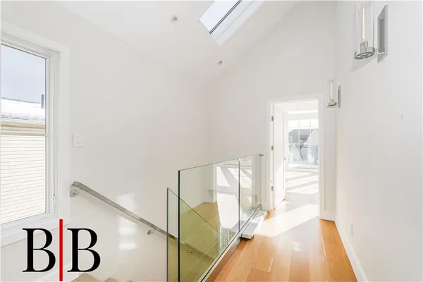 a view of a bathroom with a glass door