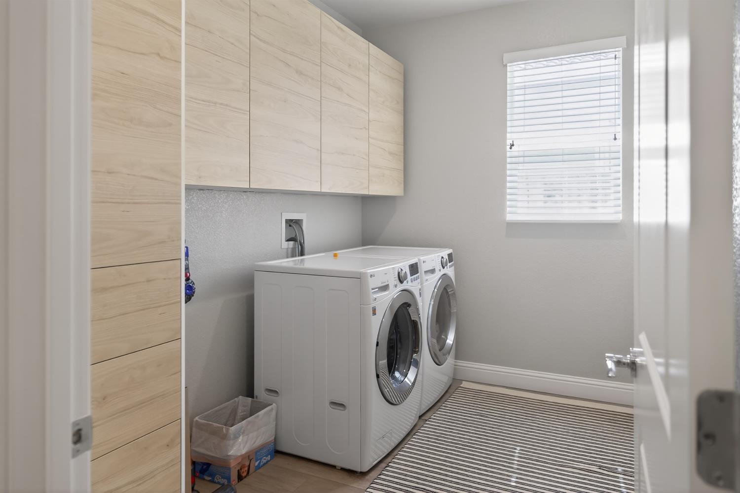183 Michael Cox Lane Tracy, CA 95377 - Photo 16 of 35 a utility room with dryer and washer