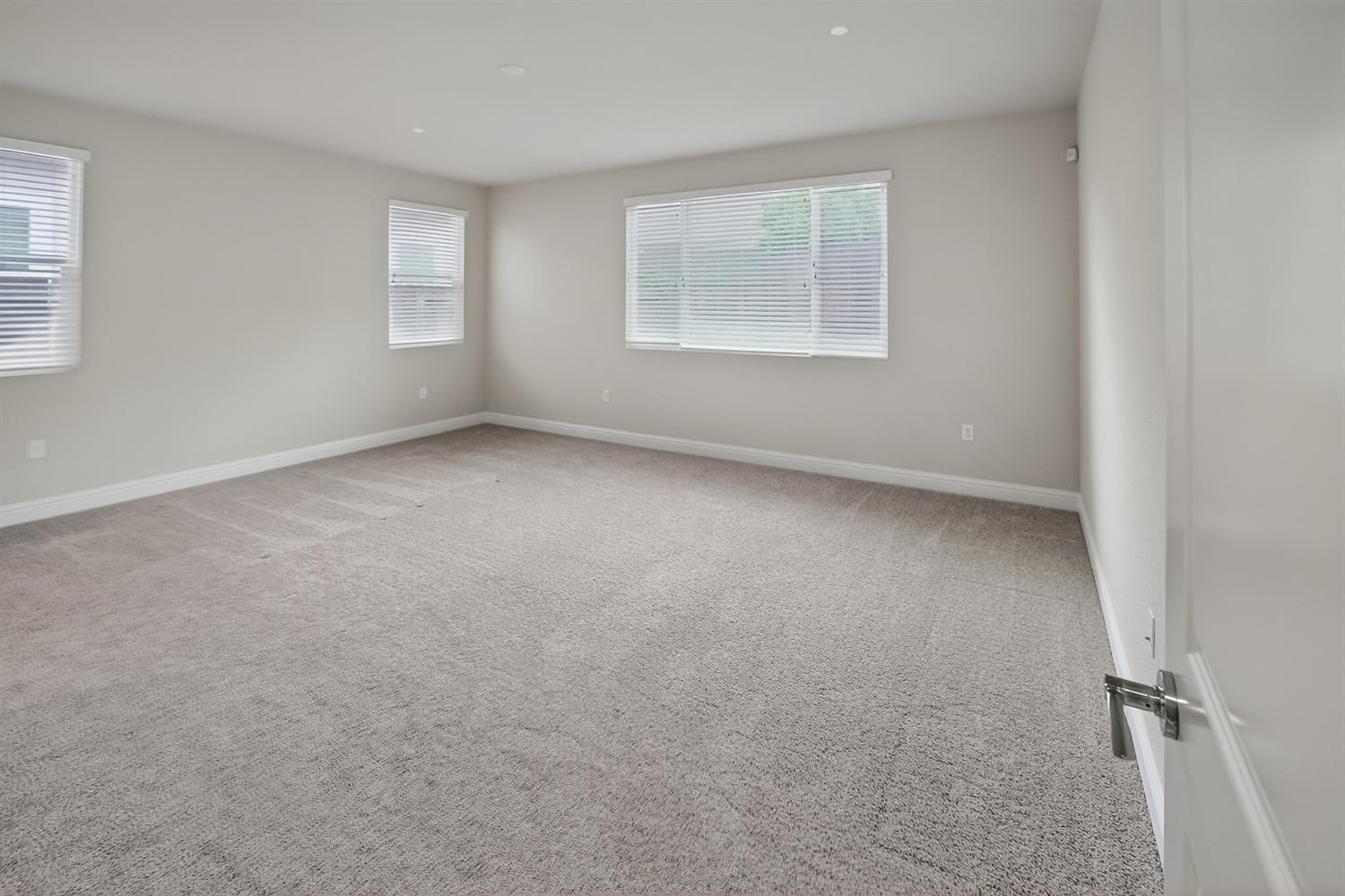 183 Michael Cox Lane Tracy, CA 95377 - Photo 18 of 35 an empty room with windows