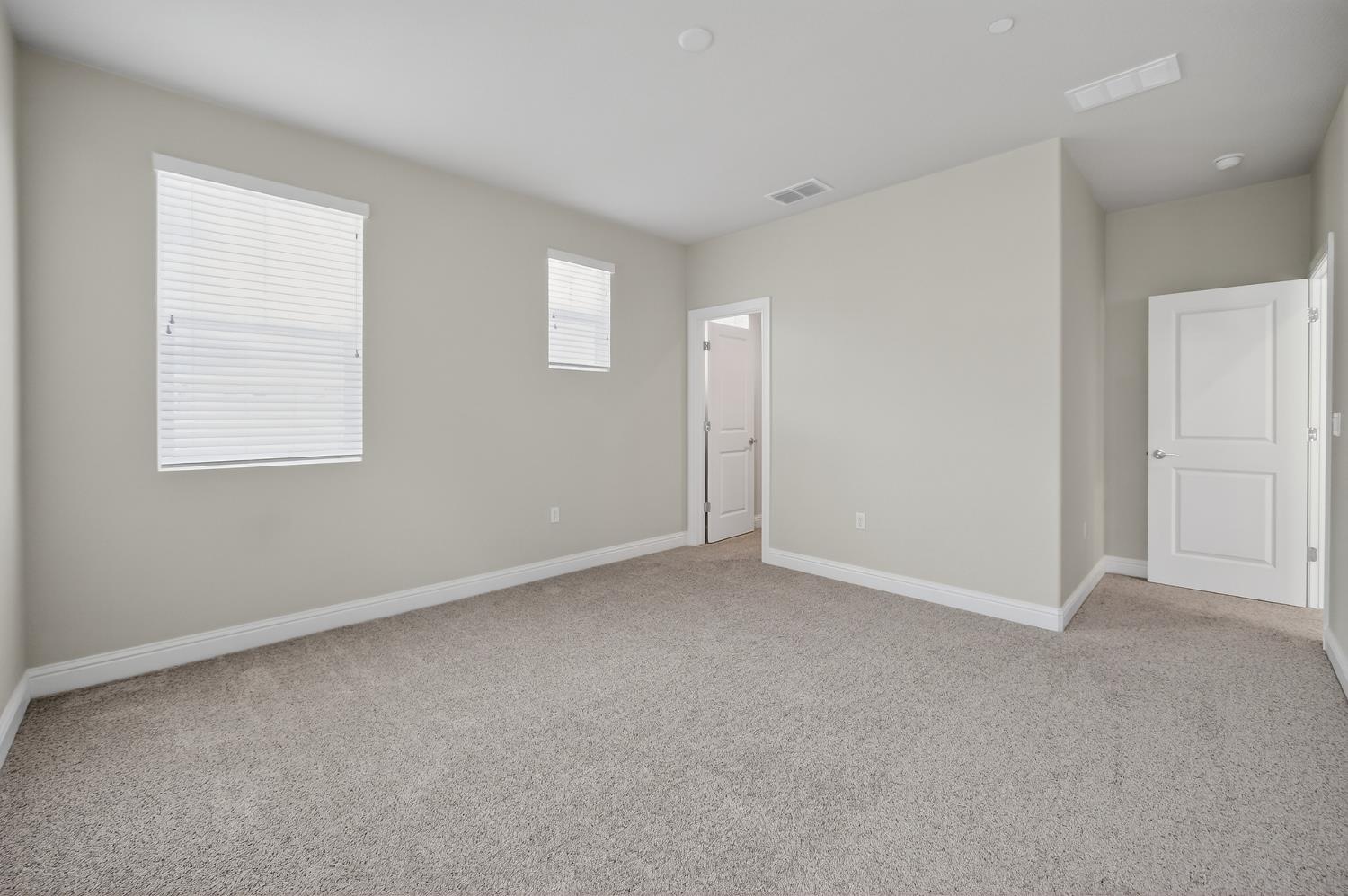 183 Michael Cox Lane Tracy, CA 95377 - Photo 27 of 35 an empty room with windows
