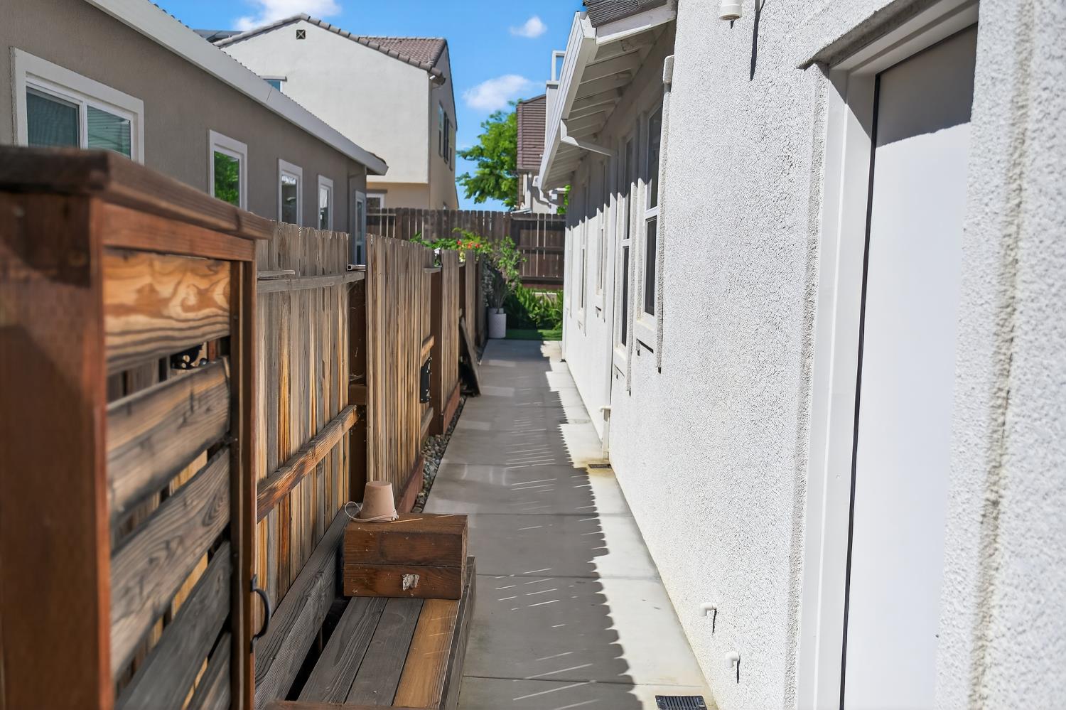 183 Michael Cox Lane Tracy, CA 95377 - Photo 32 of 35 a view of a pathway of a building