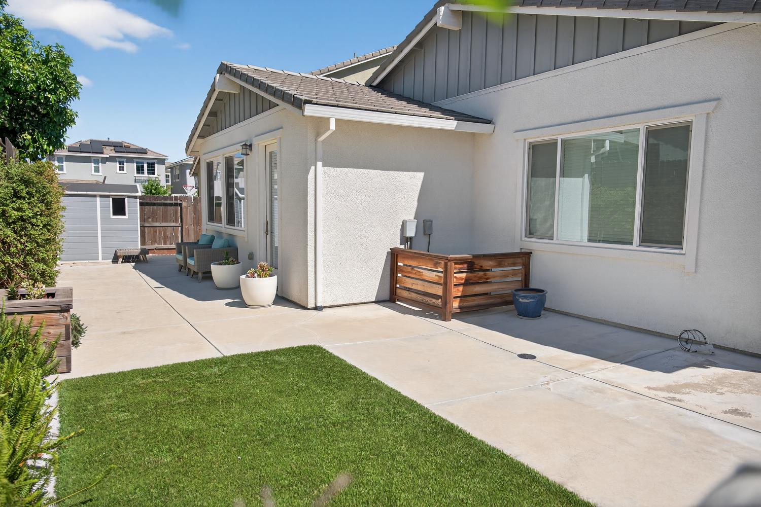 183 Michael Cox Lane Tracy, CA 95377 - Photo 34 of 35 a backyard of a house with seating space
