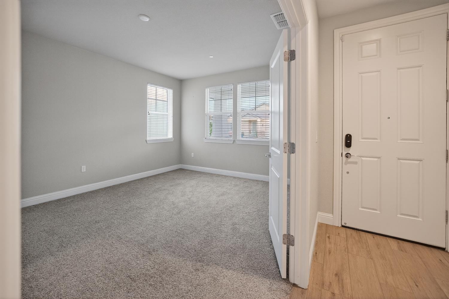 183 Michael Cox Lane Tracy, CA 95377 - Photo 6 of 35 an empty room with windows