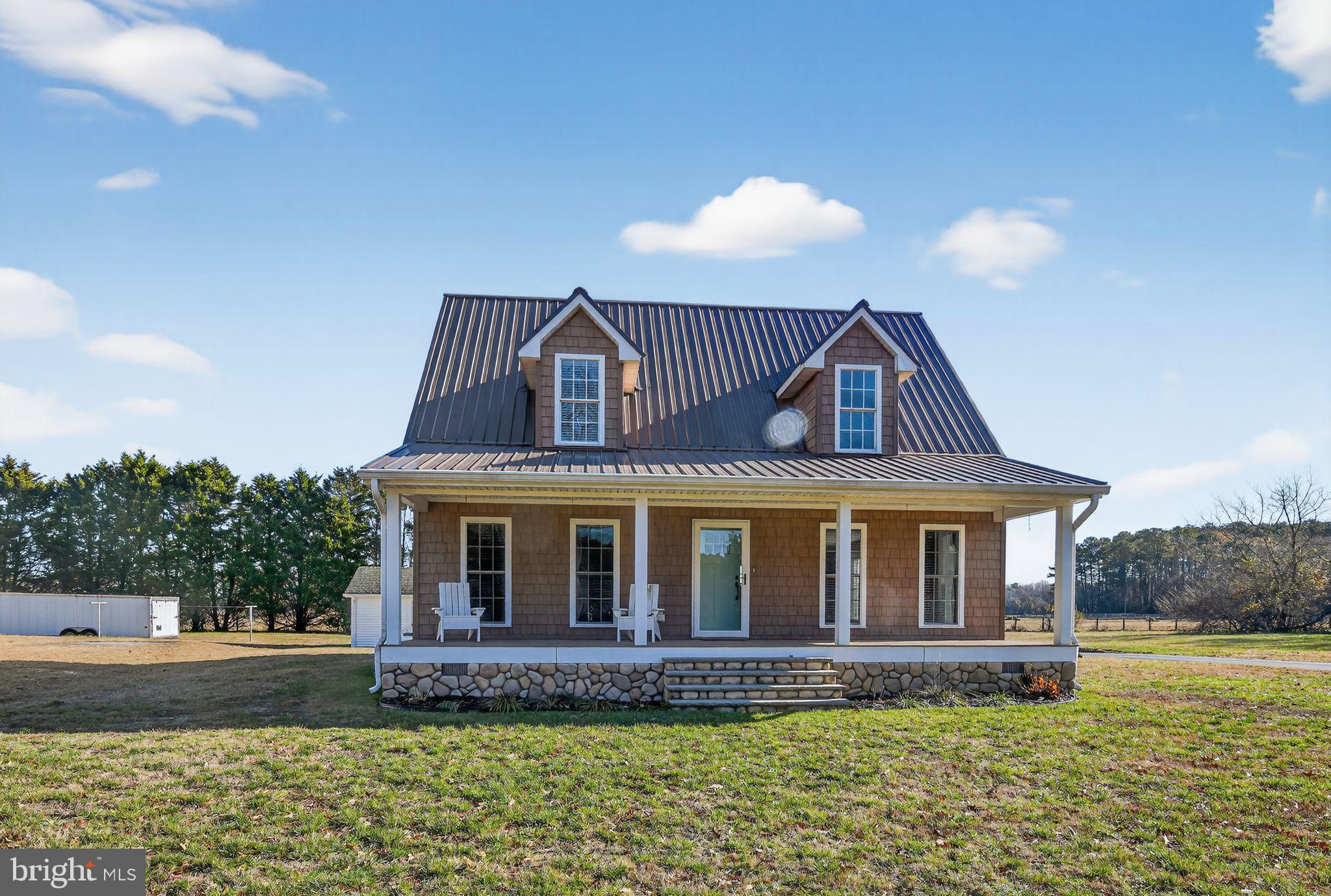 a view of a house with garden