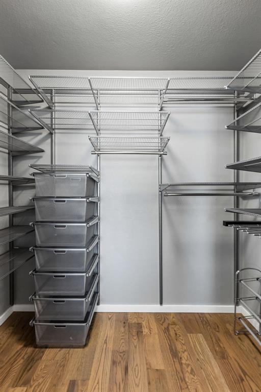 706 South Jupiter Road, Unit 307 Allen, TX 75002 - Photo 17 of 32 Custom walk-in closet in primary bedroom