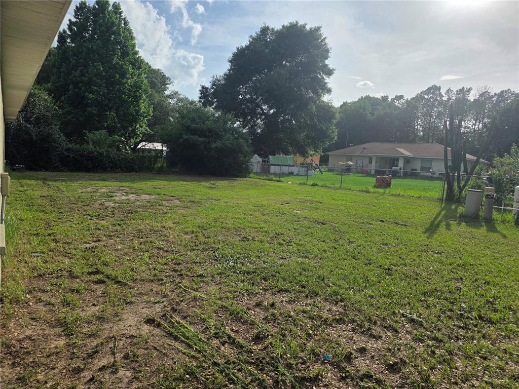 9 Cedar Run Ocala, FL 34472 - Photo 15 of 15 a view of a field of grass and trees