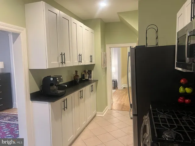 a bathroom with a sink and a shower
