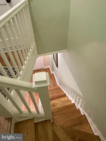 a view of a hallway with workspace