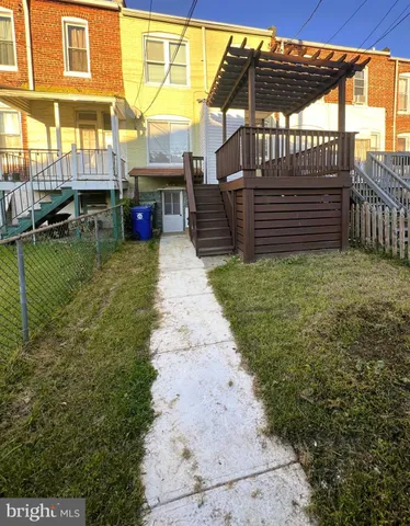 a view of balcony with furniture