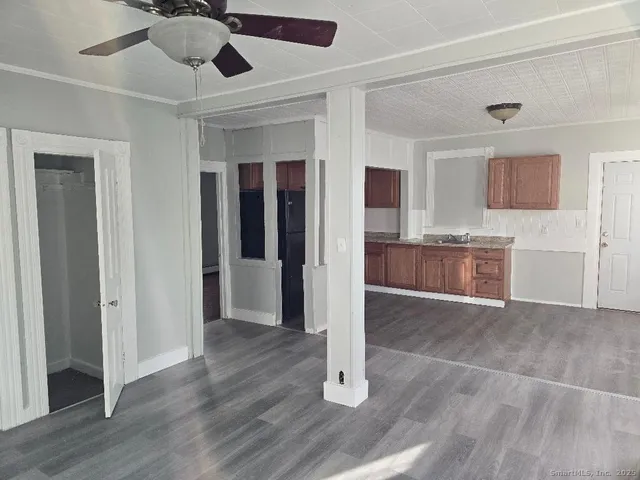 a view interior of a house wooden floor and cabinet