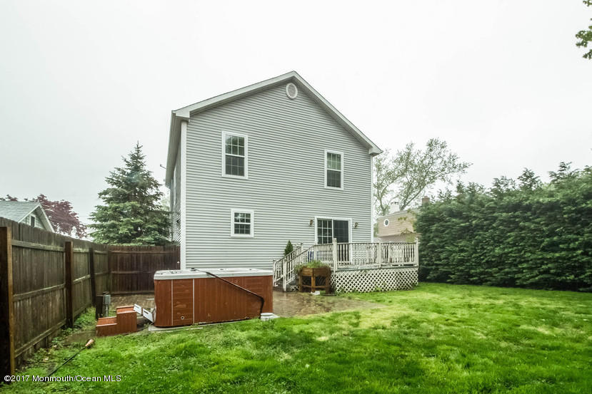1320 Squirrel Road Wall, NJ 07719 - Photo 23 of 24 a backyard of a house with seating space