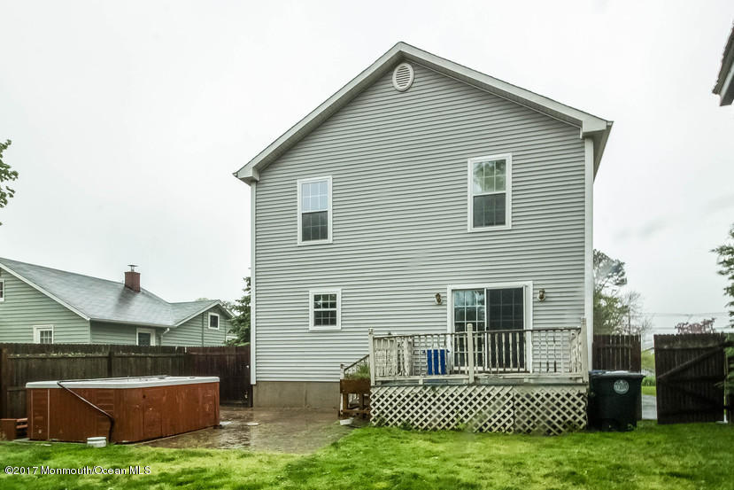 1320 Squirrel Road Wall, NJ 07719 - Photo 24 of 24 a view of a house with a yard