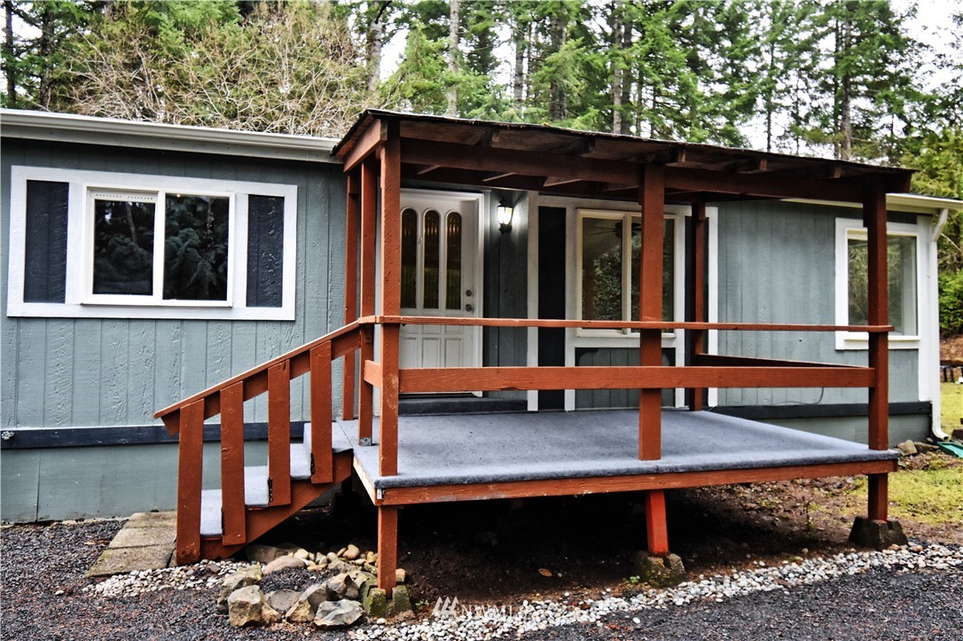 111 East Sleaford Road Shelton, WA 98584 - Photo 3 of 32 a view of a house with a wooden deck