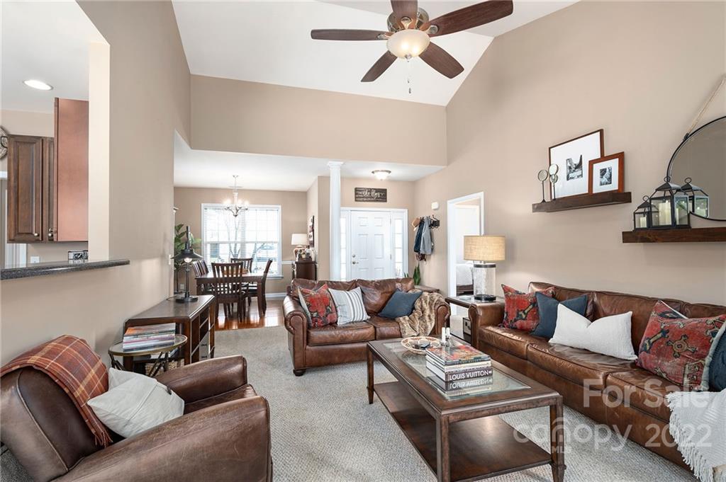 132 Haw River Road Fletcher, NC 28732 - Photo 4 of 23 a living room with furniture and a wooden floor