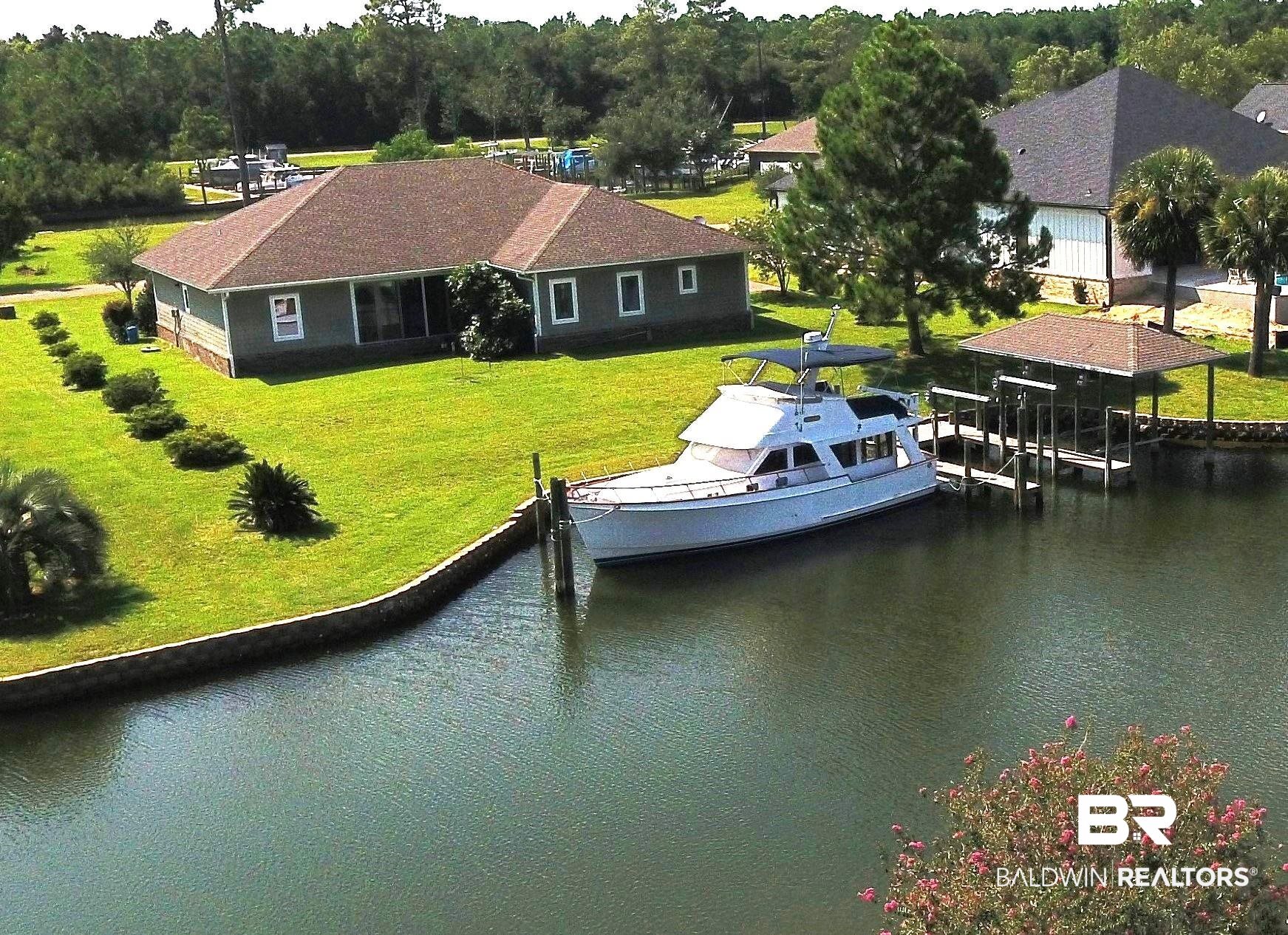 6426 East Quarry Drive Elberta, AL 36530 - Photo 19 of 19 Exterior space with a water view and a lawn